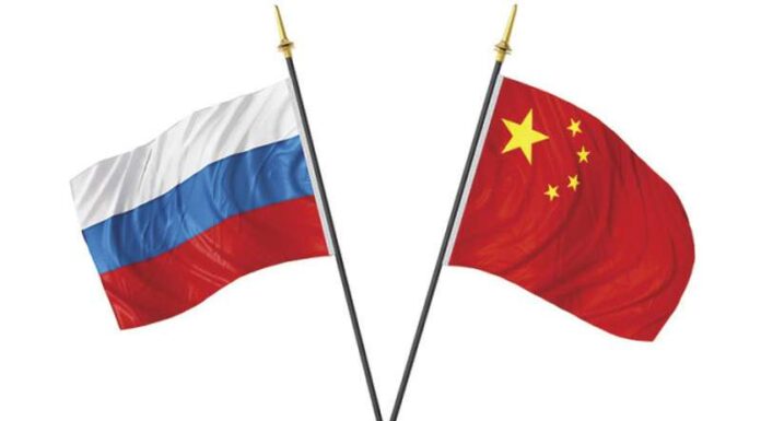 Россия-Китай. Дружеское рукопожатие Россия-Китай